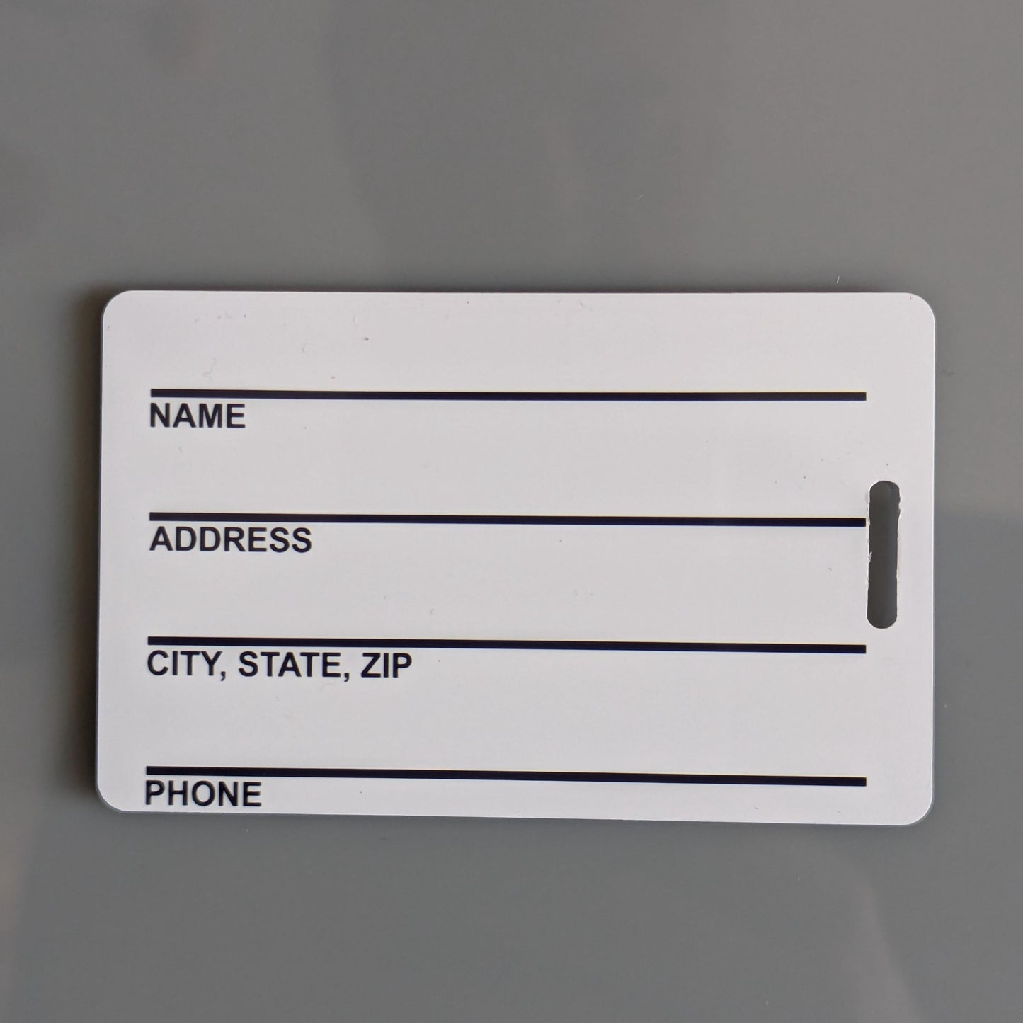 Mann Co Asset Luggage Tag